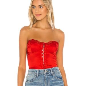 Red corset body suit from Revolve